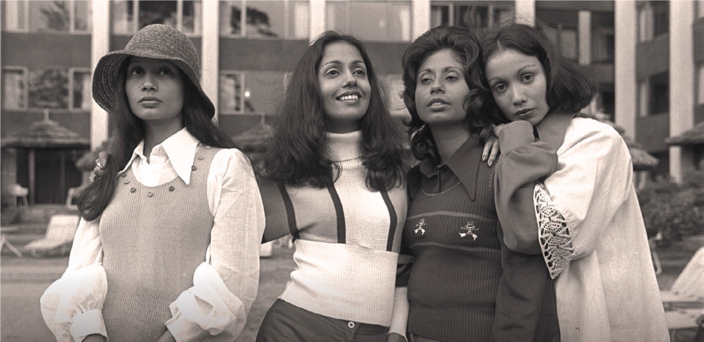The Ibrahim sisters (from left) Fatimah, Rabiah, Carol and Faith preparing for a lunchtime fashion show at the Island Ballroom of Hyatt Hotel in the late 1960s. Courtesy of Singapore Press Holdings.